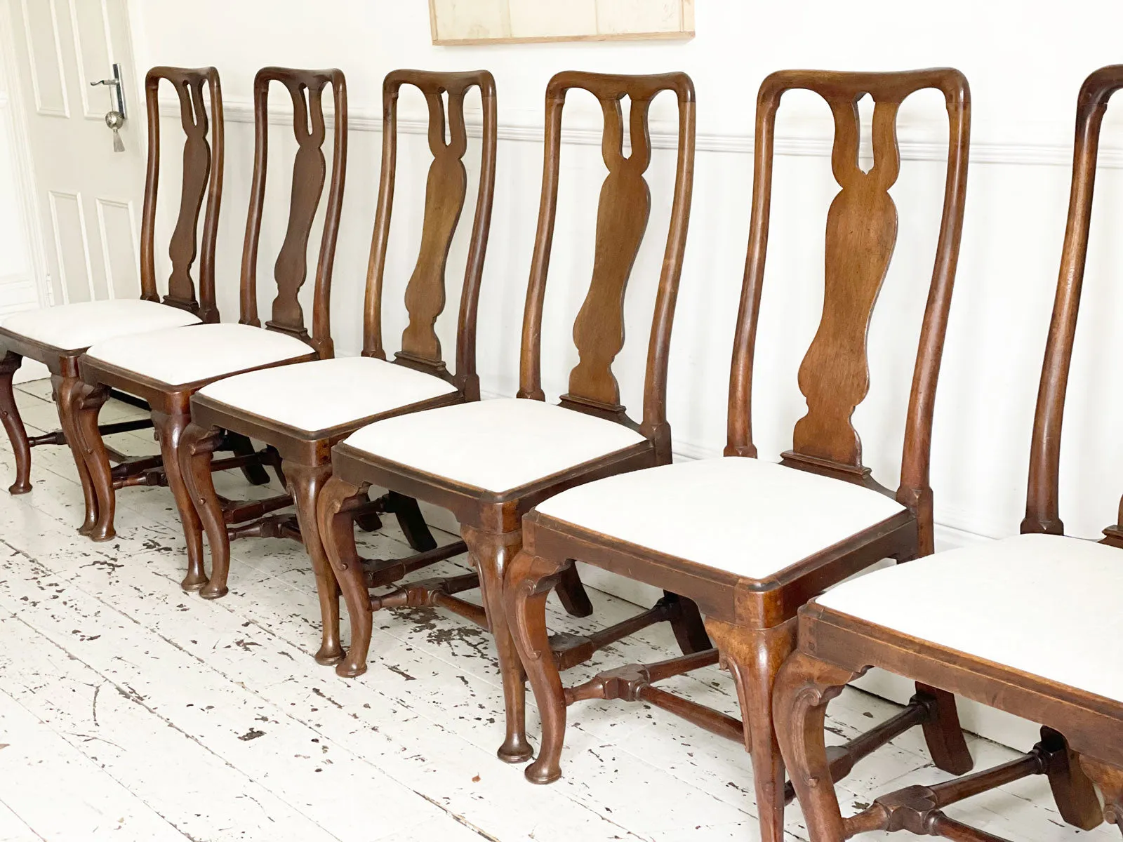 A Set of Six Georgian Walnut Dining Chairs